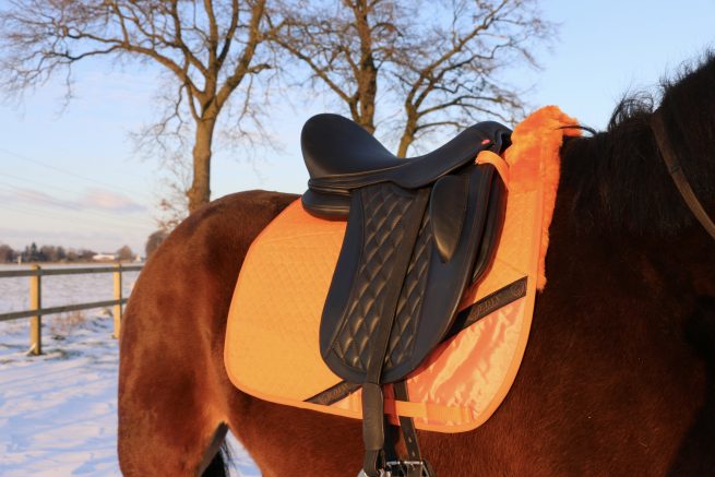 EDIX Uni dressuur Merino scheepkin 8-pocket saddle pad